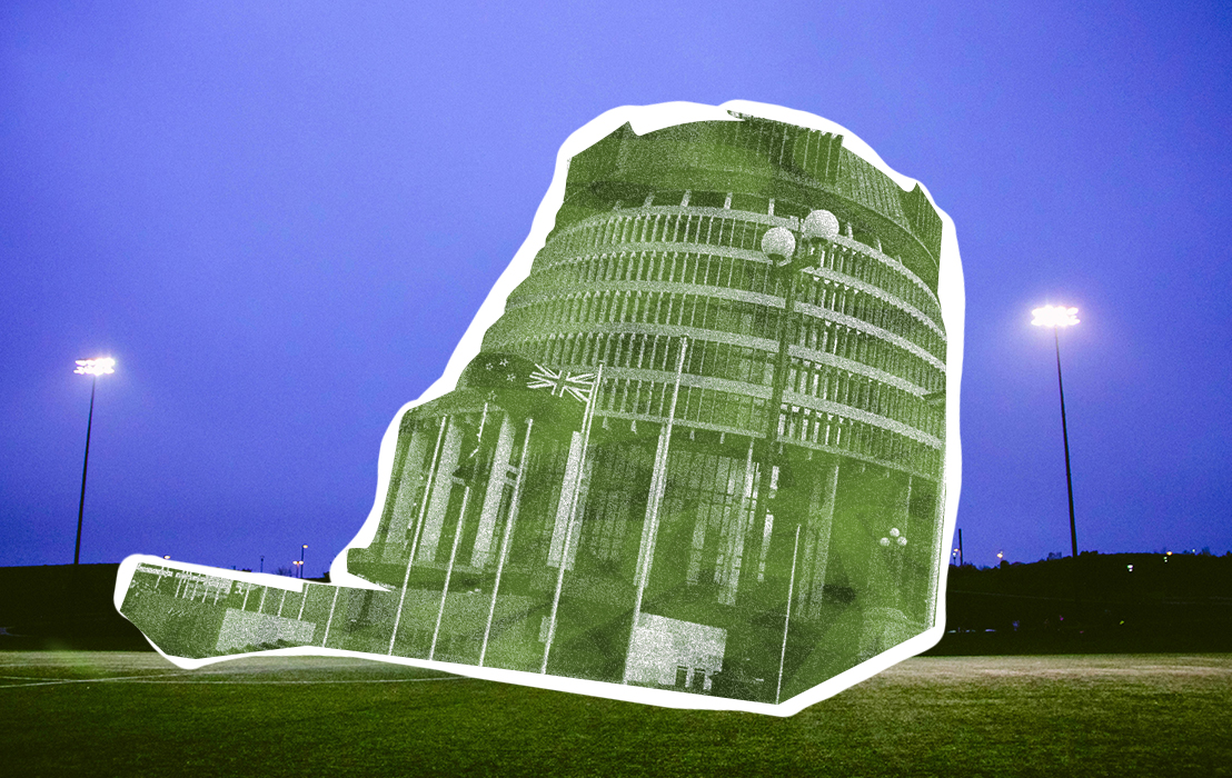 NZ parliament (beehive) on a dark football field